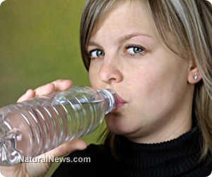 Woman-Drinking-Water-Plastic-Bottle